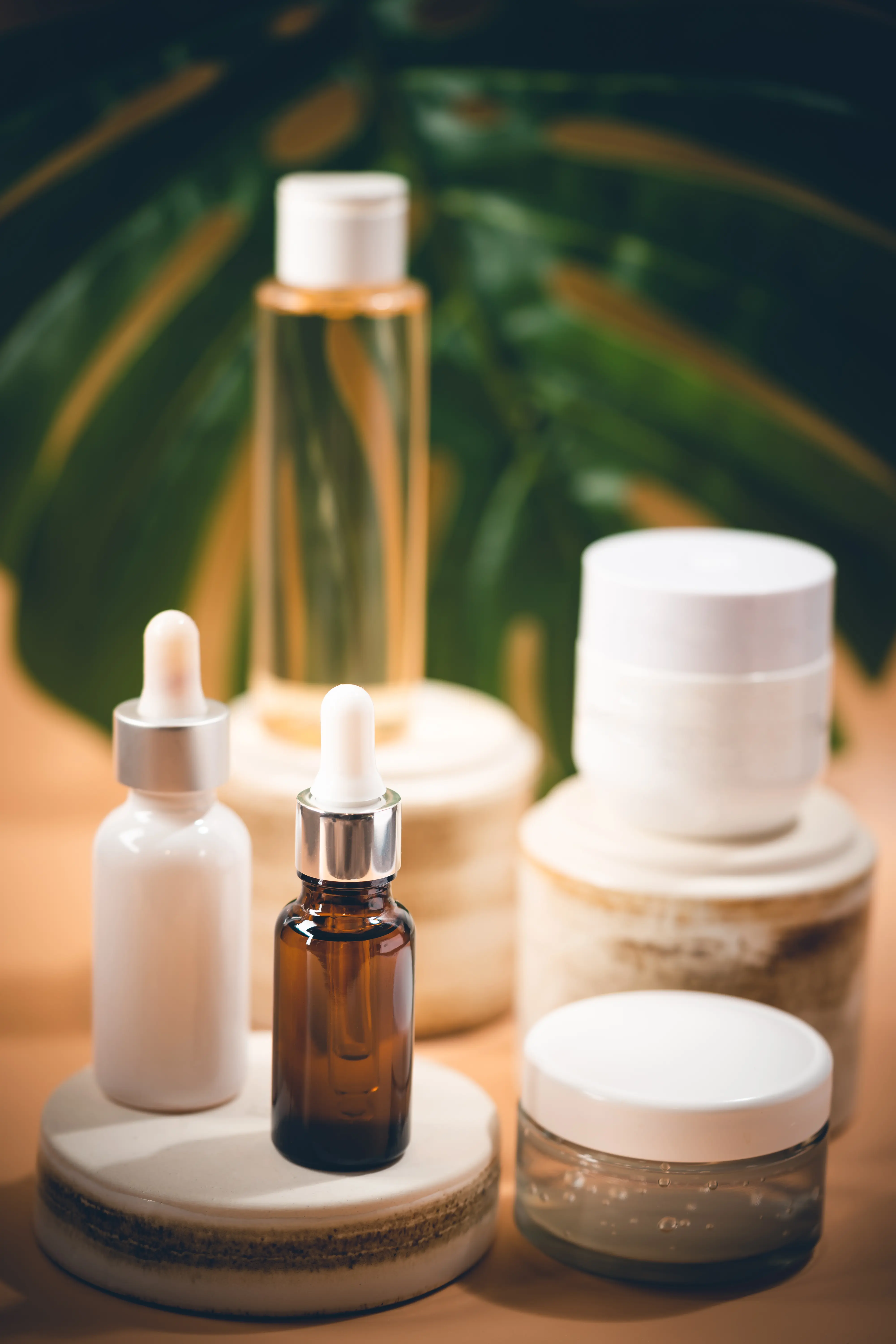 A range of skincare cosmetic product bottles